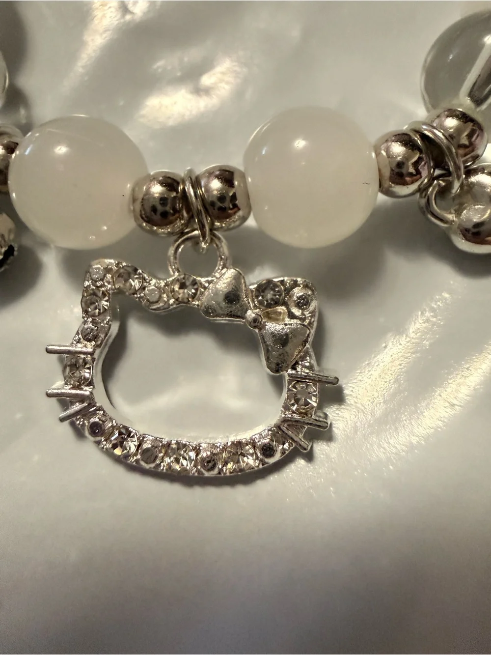 White Beaded Charm Bracelet with Silver Hello Kitty Pendant